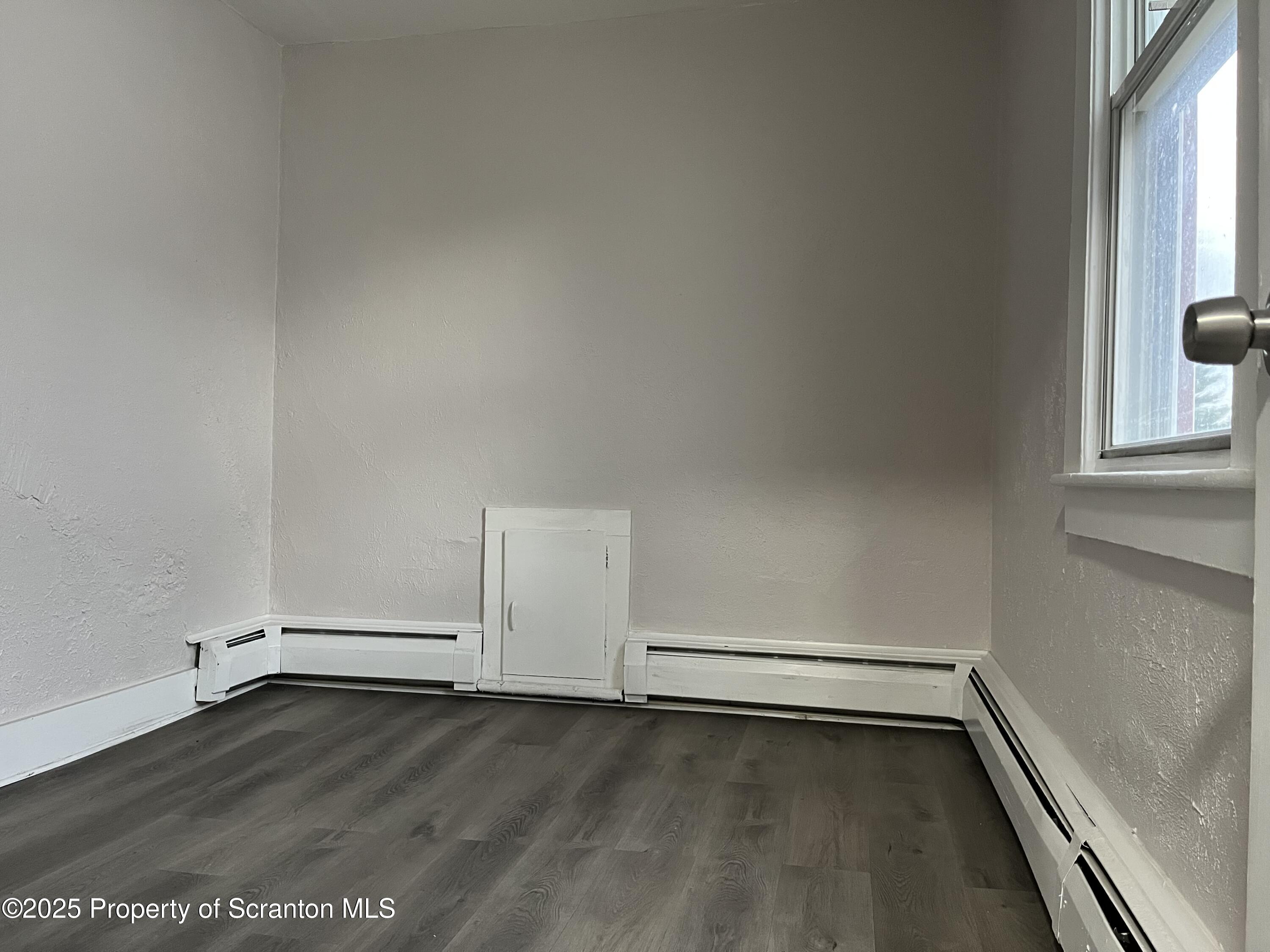 315 Aswell Court Scranton, PA 18504 - Photo 10 of 17 a view of a room with wooden floor