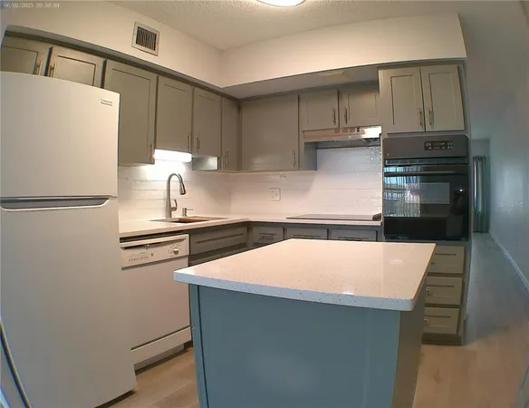 a kitchen with cabinets