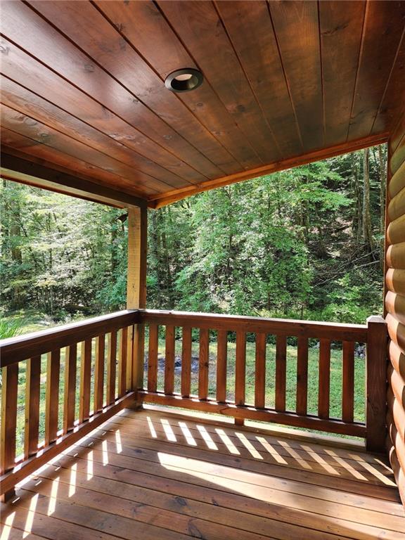 519 Barnes Drive Ellijay, GA 30540 - Photo 13 of 15 a porch with wooden floor in outdoor space
