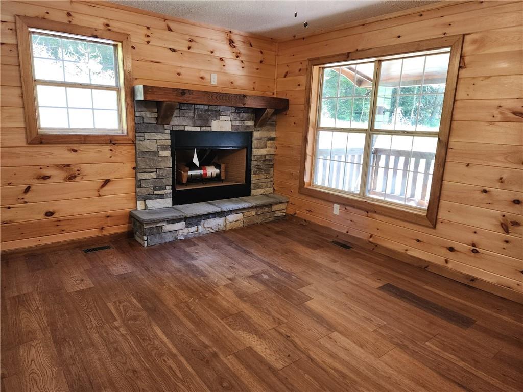 519 Barnes Drive Ellijay, GA 30540 - Photo 3 of 15 a living room with furniture and a fireplace