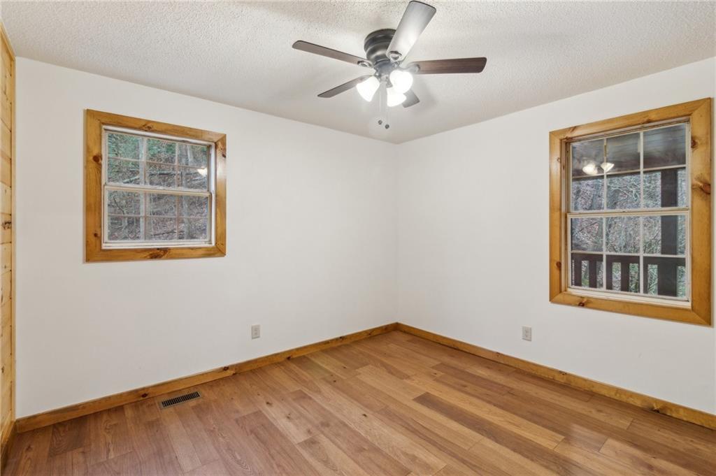 519 Barnes Drive Ellijay, GA 30540 - Photo 9 of 15 an empty room with a window