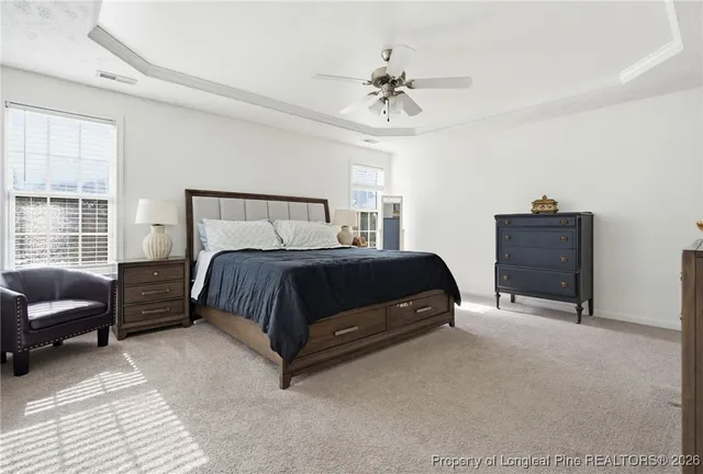 a bedroom with a bed and furniture