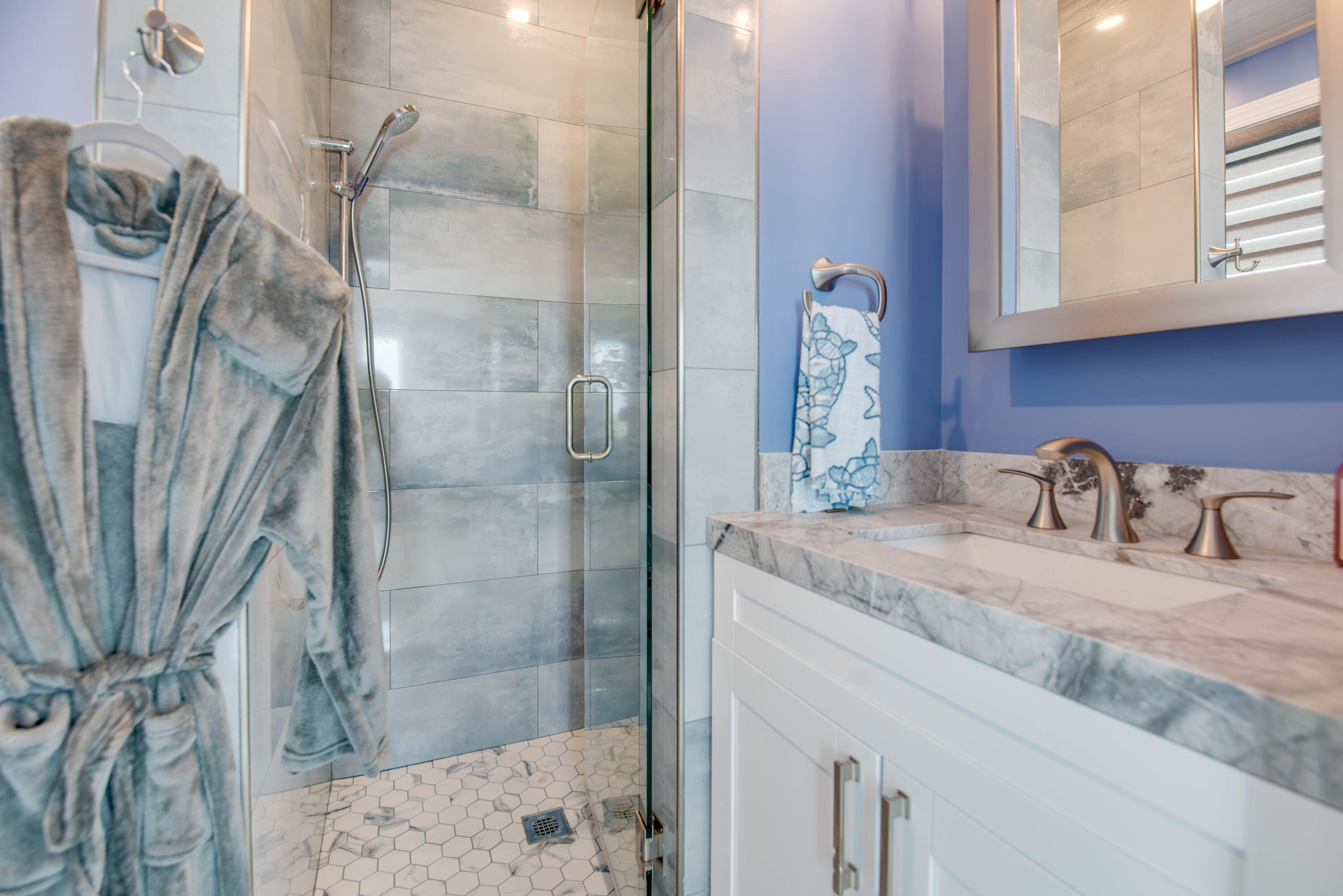 747 La Fitte Road Summerland Key, FL 33042 - Photo 99 of 103 a bathroom with a granite countertop sink a mirror and shower
