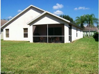 17732 Oakmont Ridge Circle Fort Myers, FL 33967 - Photo 5 of 7 a view of a house with backyard