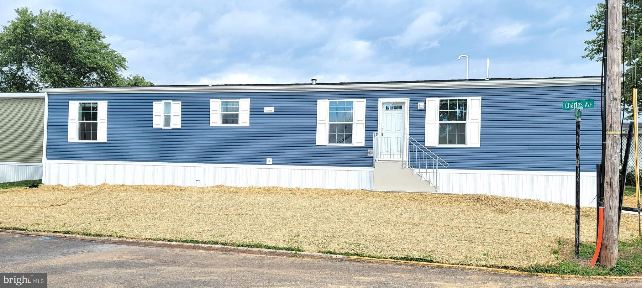 a front view of house with yard