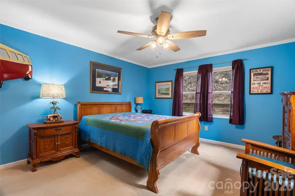 a bathroom with a sink mirror vanity and toilet