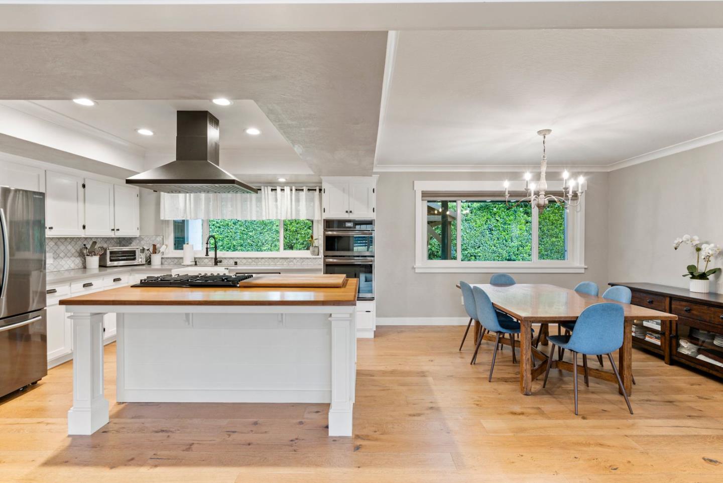 105 Rays Circle Hollister, CA 95023 - Photo 11 of 37 a kitchen with a table and chairs in it