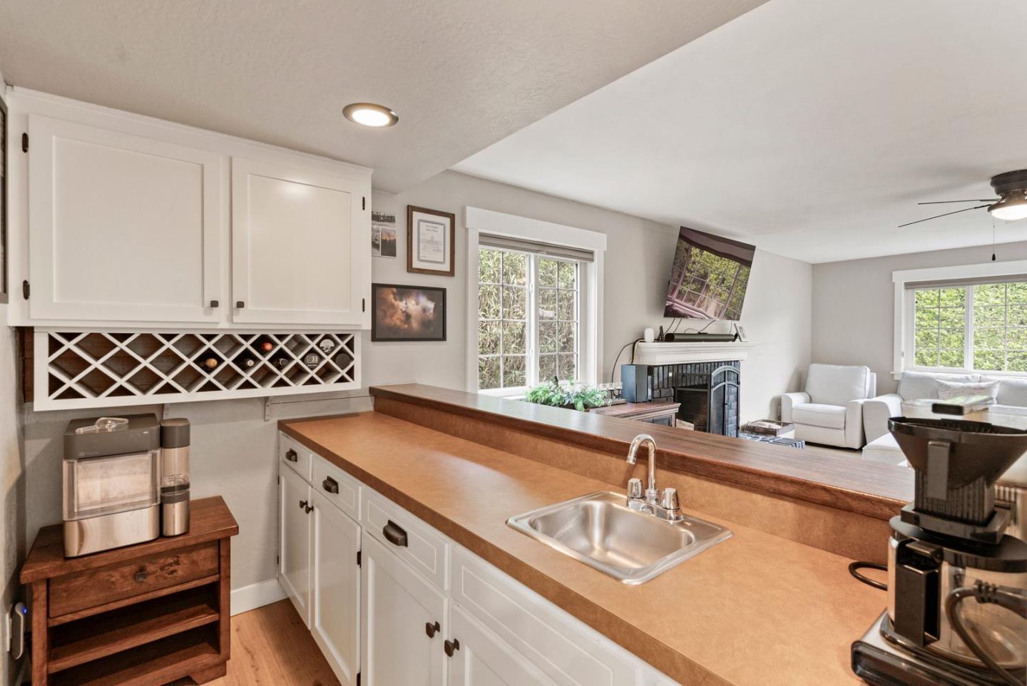 105 Rays Circle Hollister, CA 95023 - Photo 16 of 36 a kitchen with sink refrigerator and window