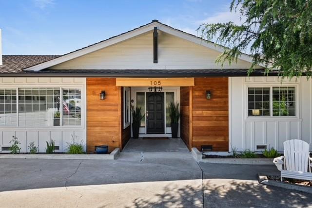 105 Rays Circle Hollister, CA 95023 - Photo 2 of 37 a front view of a house with garage
