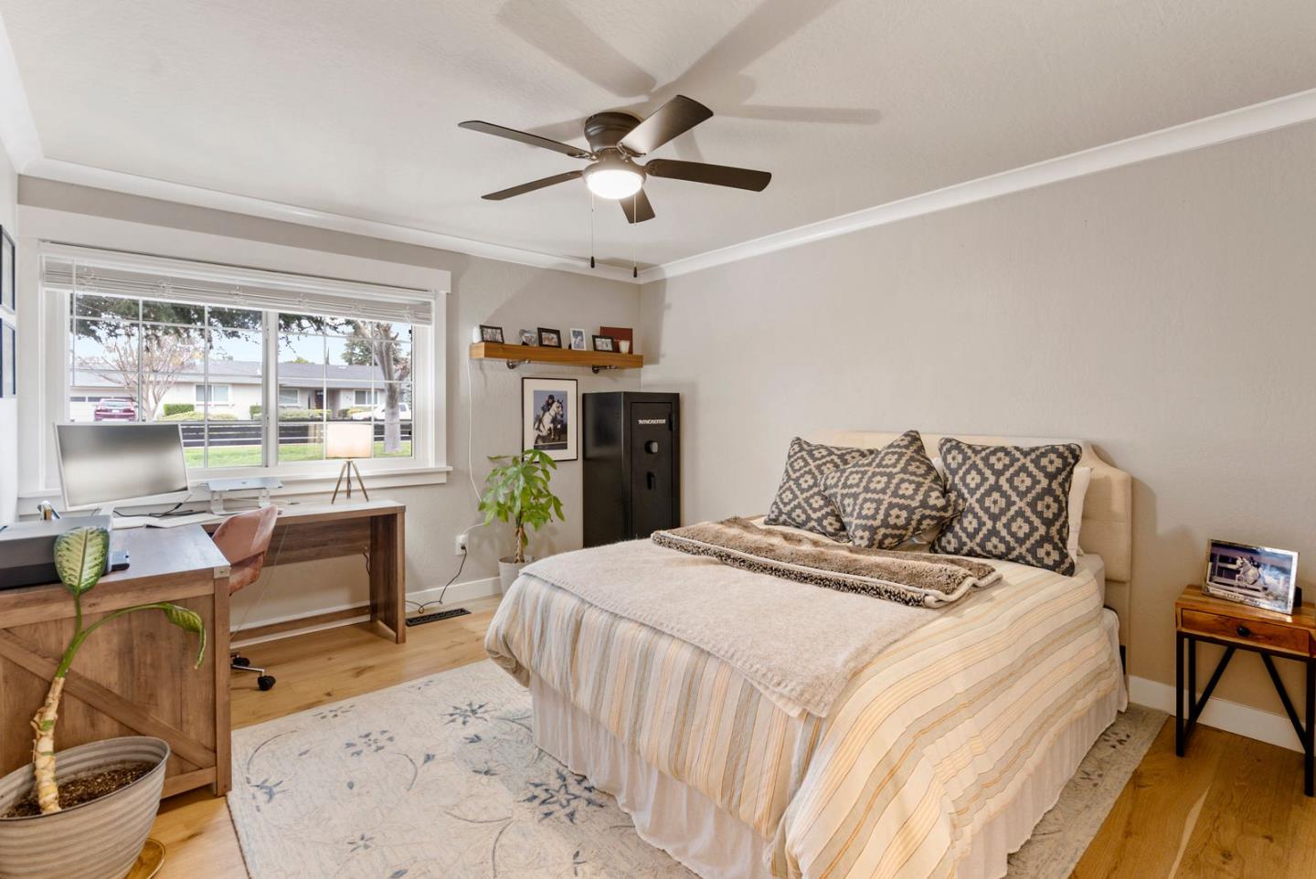 105 Rays Circle Hollister, CA 95023 - Photo 21 of 37 a bedroom with a bed and a chair