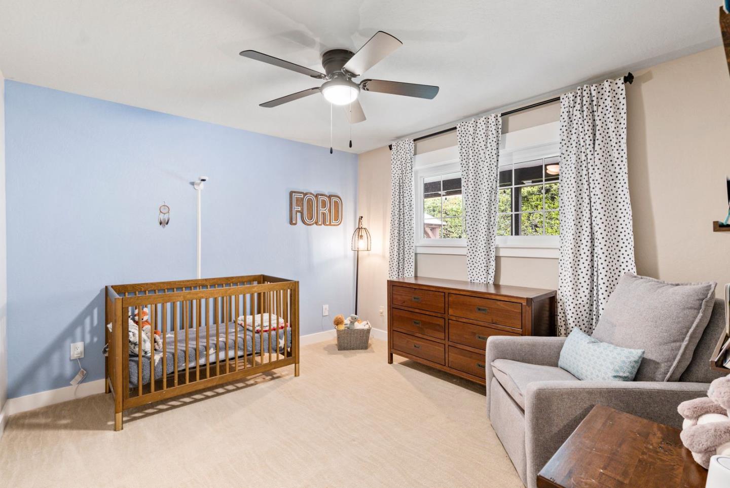 105 Rays Circle Hollister, CA 95023 - Photo 25 of 37 a living room with a bed couch and a window