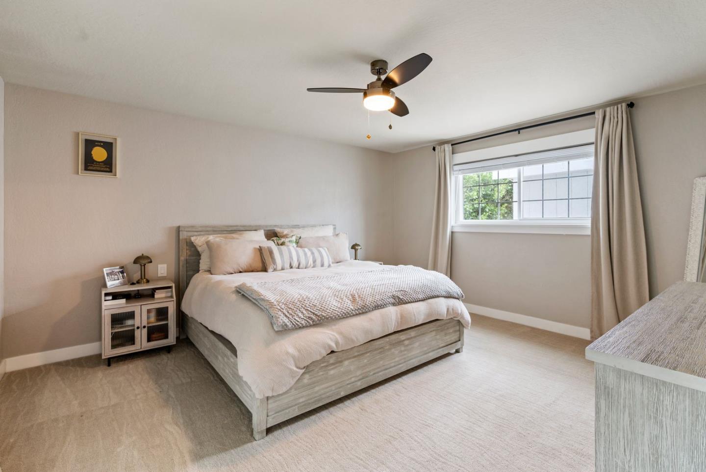 105 Rays Circle Hollister, CA 95023 - Photo 28 of 37 a bedroom with a bed and window