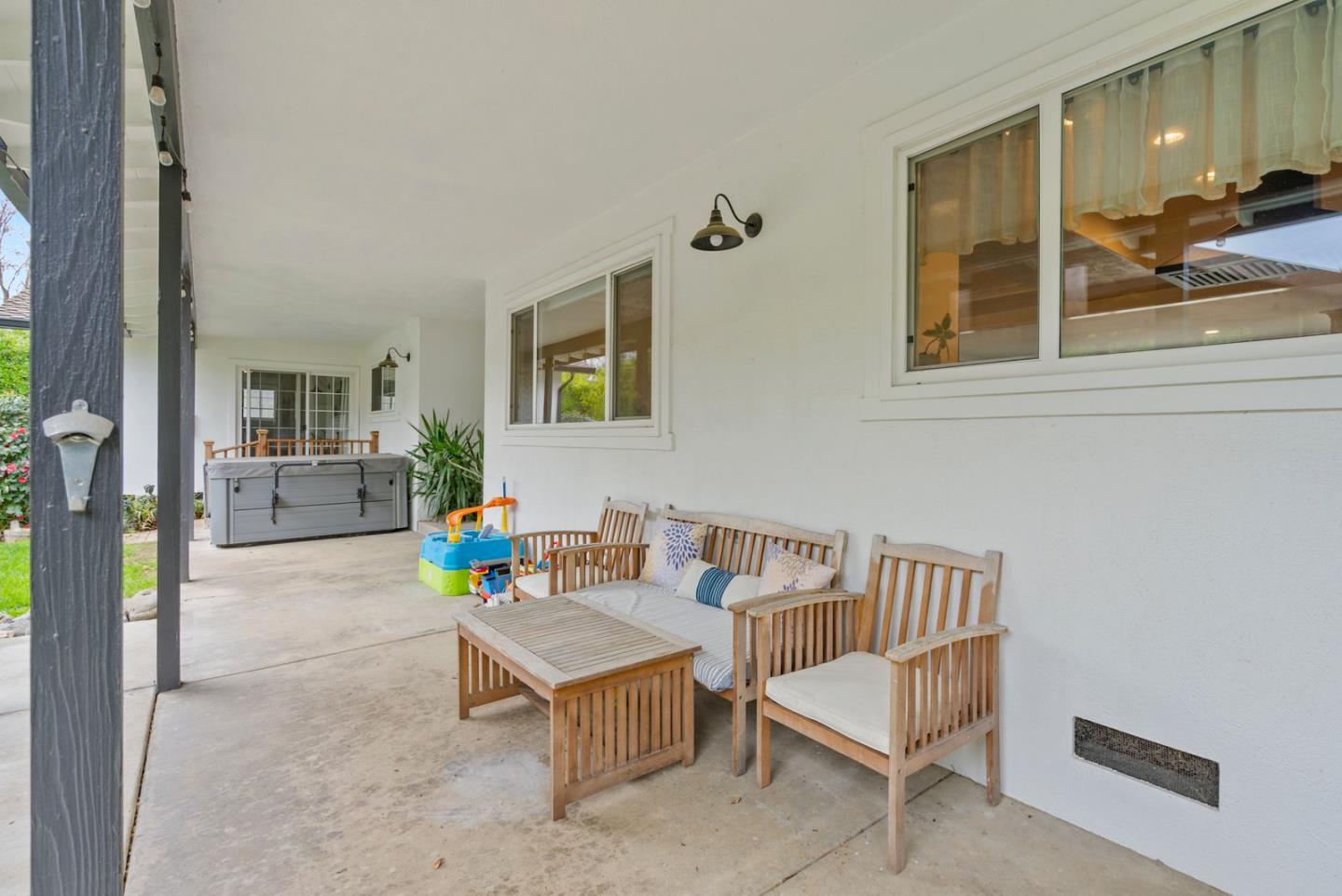 105 Rays Circle Hollister, CA 95023 - Photo 31 of 36 a living room with furniture and a table
