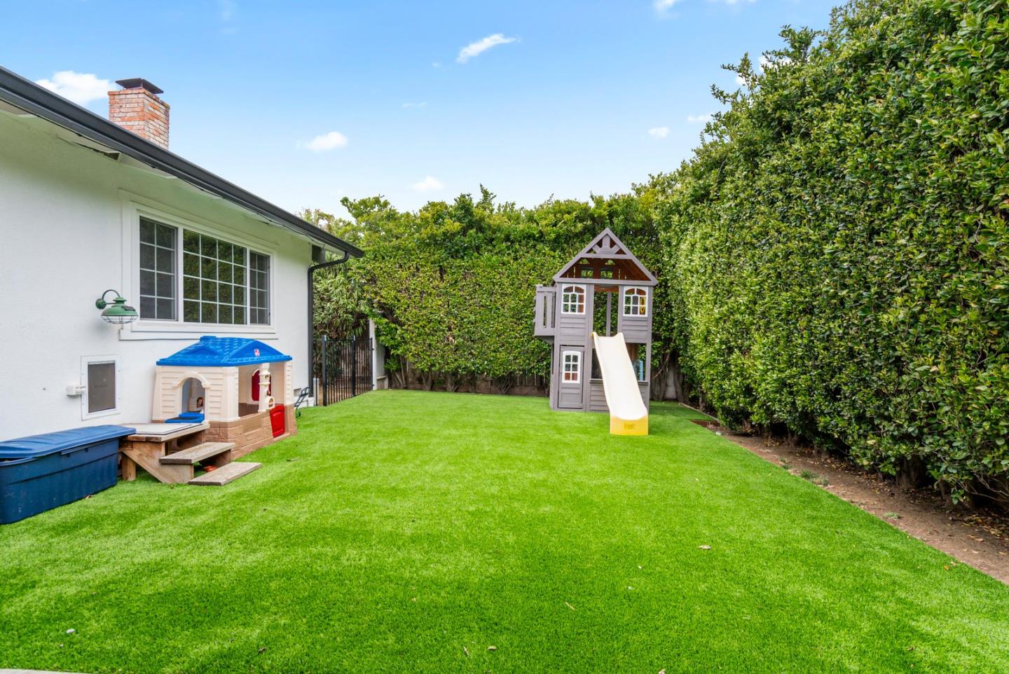 105 Rays Circle Hollister, CA 95023 - Photo 35 of 37 a front view of a house with a yard table and chairs