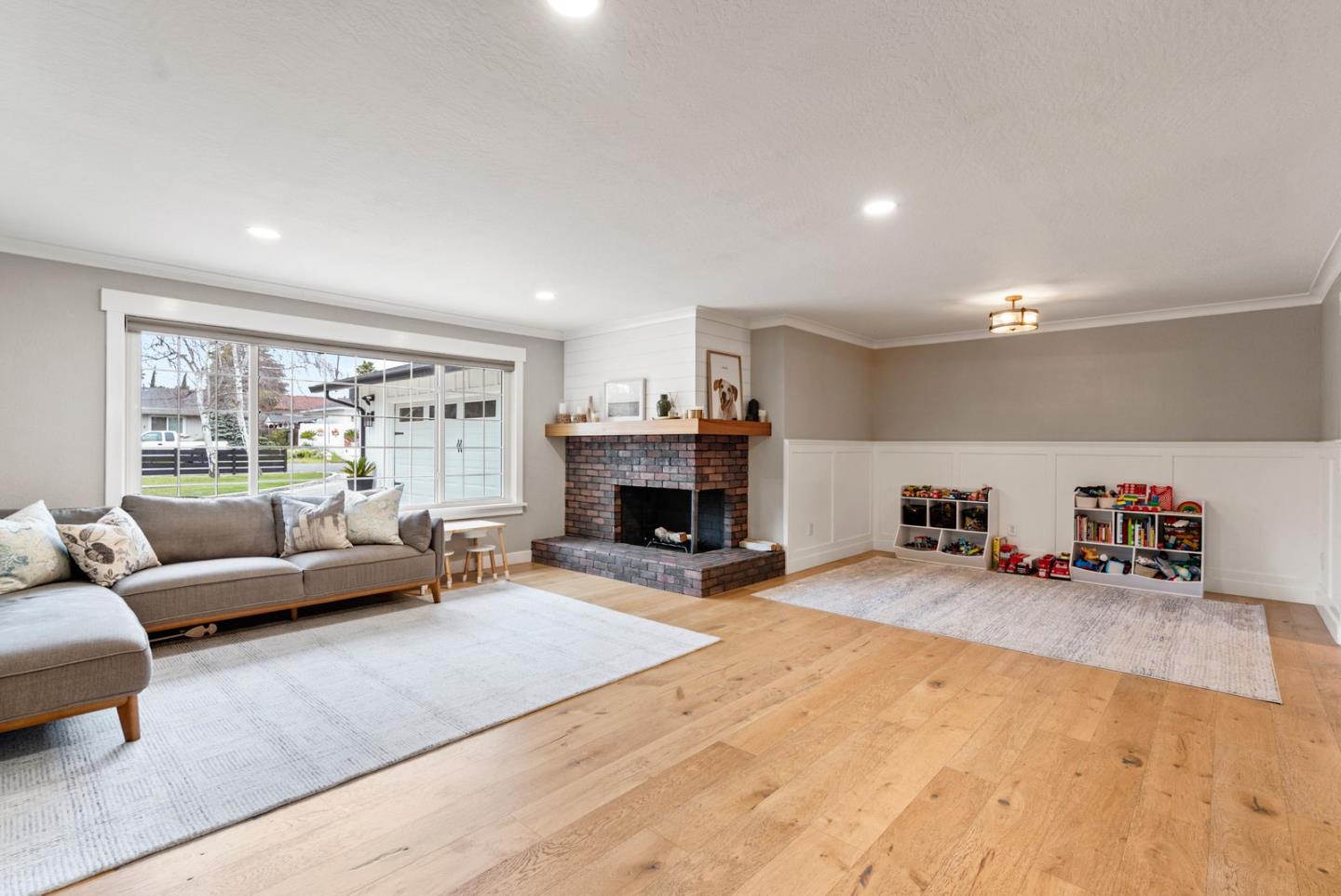 105 Rays Circle Hollister, CA 95023 - Photo 7 of 36 a living room with furniture and a fireplace