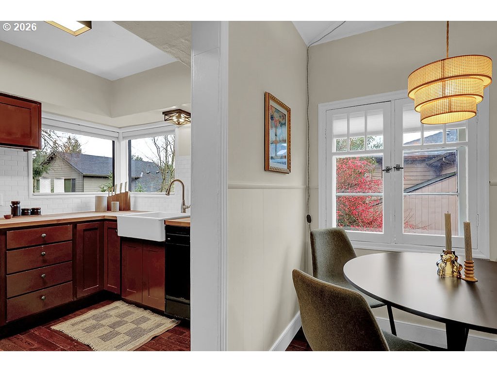 5537 Southwest Florida Street Portland, OR 97219 - Photo 14 of 45 a kitchen with a sink cabinets and window