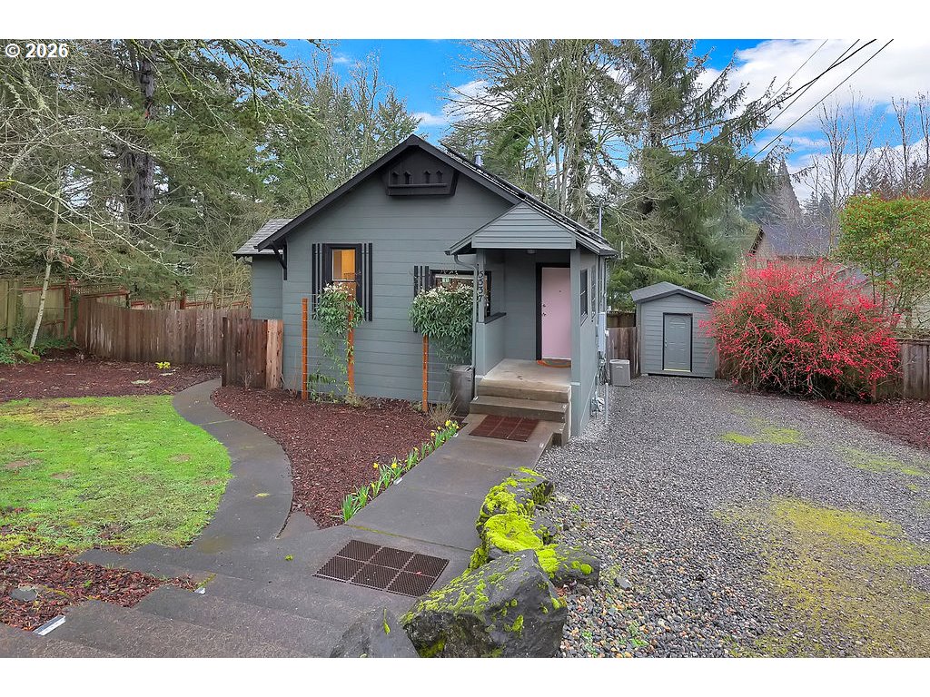 5537 Southwest Florida Street Portland, OR 97219 - Photo 3 of 45 a house view with a backyard space