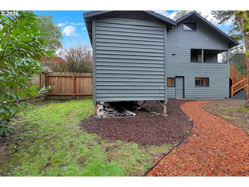 5537 Southwest Florida Street Portland, OR 97219 - Photo 38 of 45 a backyard of a house with barbeque oven