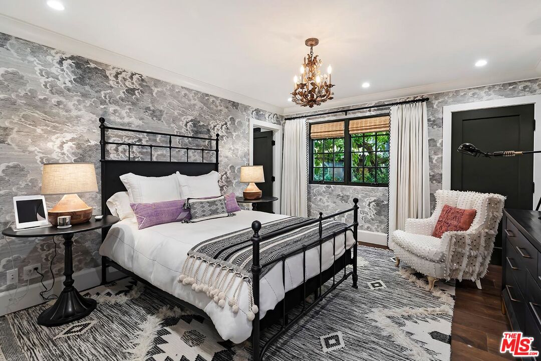 4416 Arcola Avenue Toluca Lake, CA 91602 - Photo 30 of 46 a bedroom with a bed and a couch