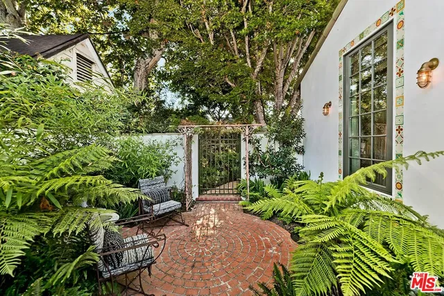a view of a table and chairs in patio