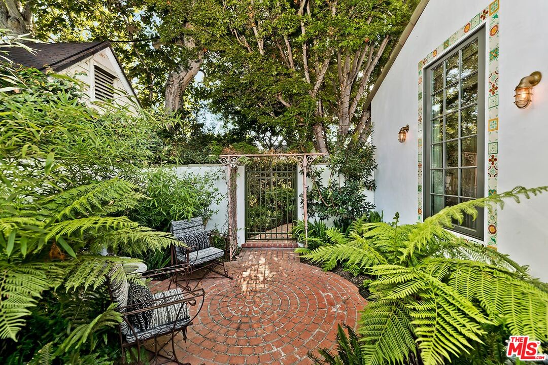 4416 Arcola Avenue Toluca Lake, CA 91602 - Photo 35 of 46 a view of a garden with pathway