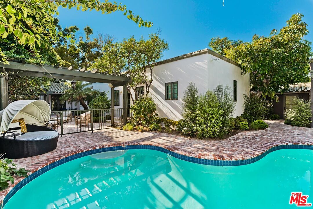 4416 Arcola Avenue Toluca Lake, CA 91602 - Photo 41 of 46 a view of backyard with swimming pool and outdoor seating