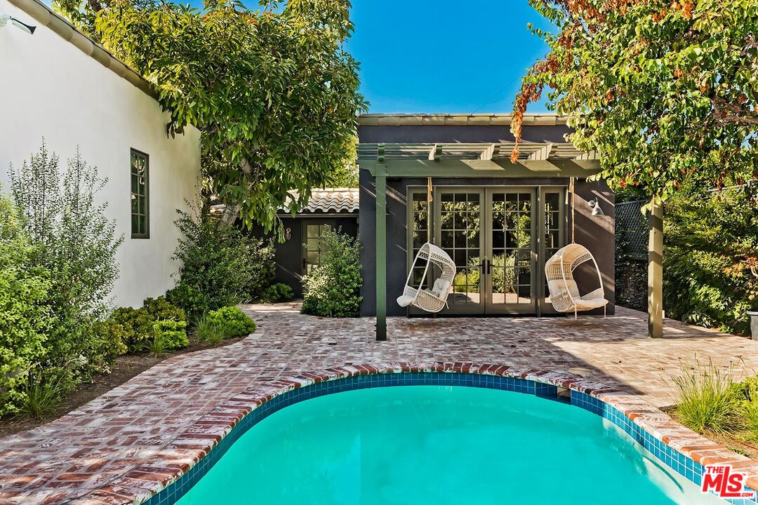 4416 Arcola Avenue Toluca Lake, CA 91602 - Photo 42 of 46 a view of a house with backyard and sitting area
