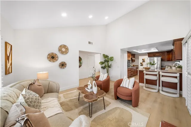 a kitchen sink with a granite countertop window and sink