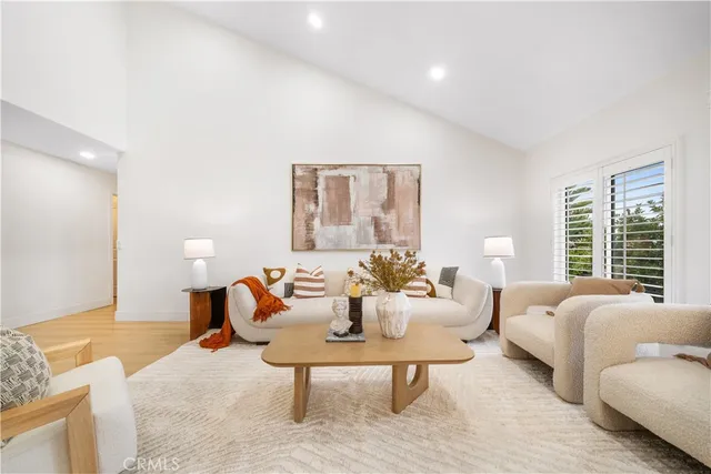 a bathroom with a granite countertop sink a mirror and a shower