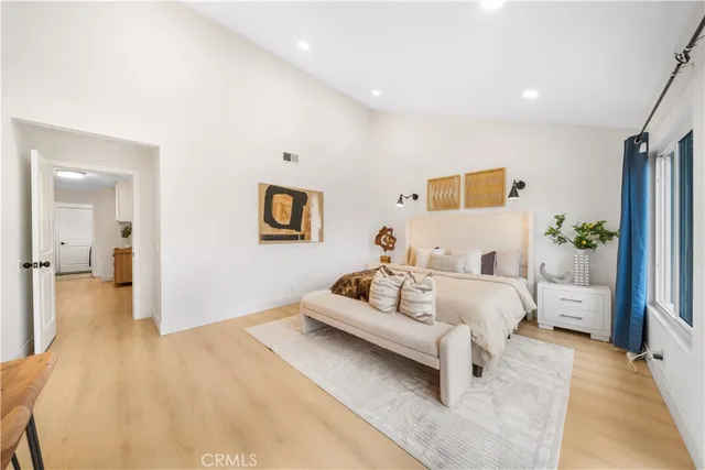 a building outdoor space with patio furniture and garden