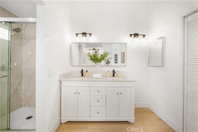 a spacious bedroom with a bed and window