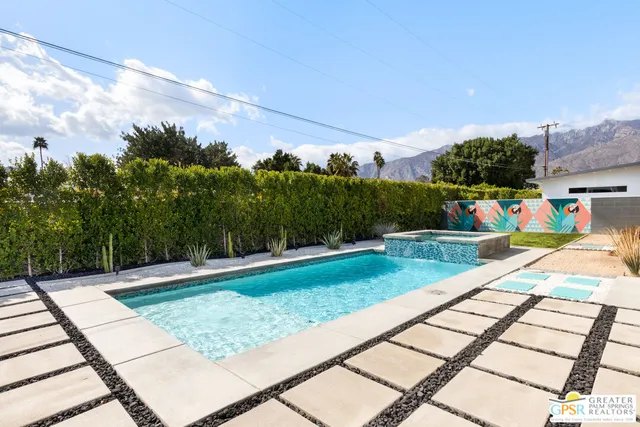 a view of a backyard with a patio