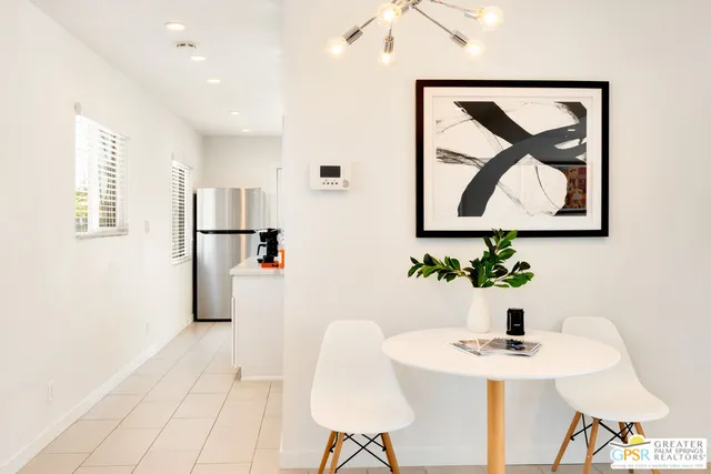 a view of kitchen with furniture and window