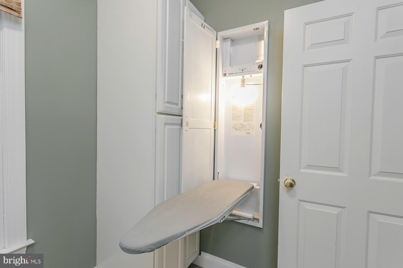 1246 Hollow Road Chester Springs, PA 19425 - Photo 30 of 34 Main Level Laundry Room w/built-in ironing board