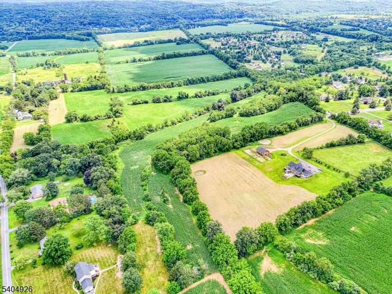 8 Roseberry Road Washington, NJ 07882 - Photo 2 of 24 a view of a large yard with lots of green space