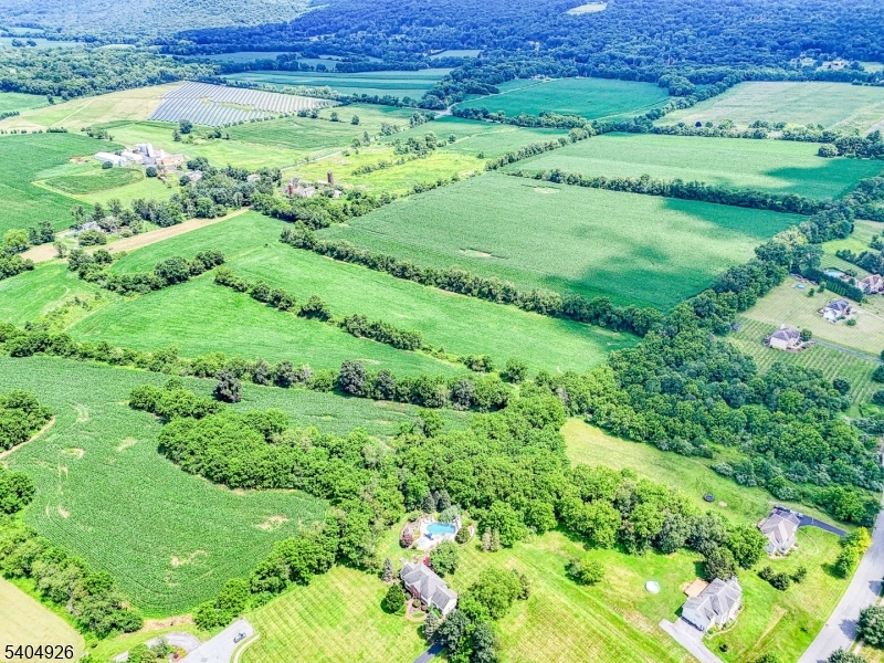 8 Roseberry Road Washington, NJ 07882 - Photo 7 of 24 a view of a lush green field