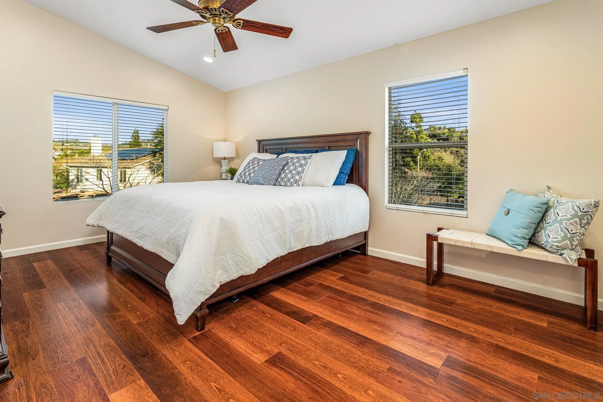 5462 Senegal Street Oceanside, CA 92057 - Photo 17 of 47 a large bedroom with a bed and window