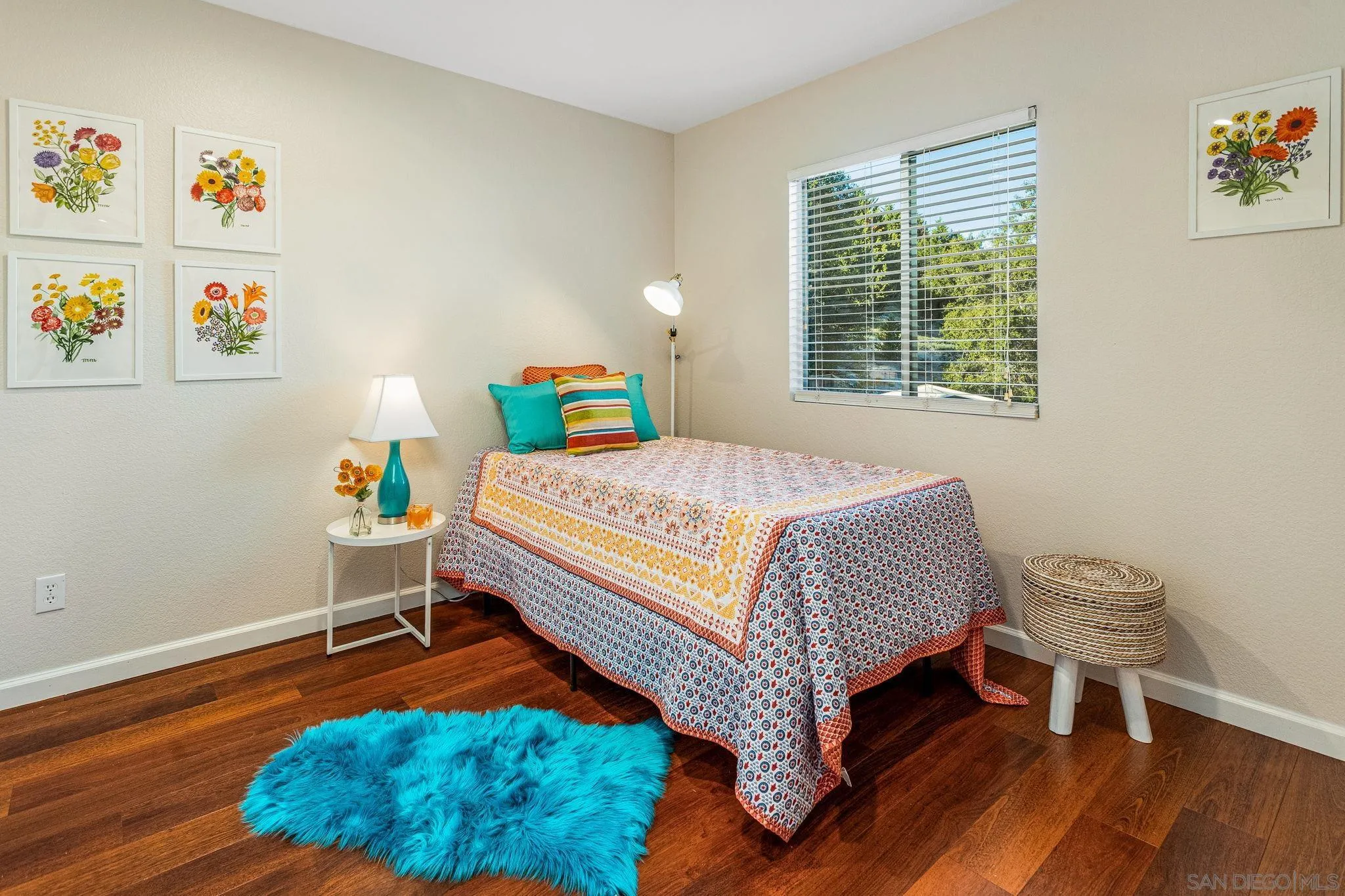 5462 Senegal Street Oceanside, CA 92057 - Photo 22 of 47 a bedroom with a bed and a window