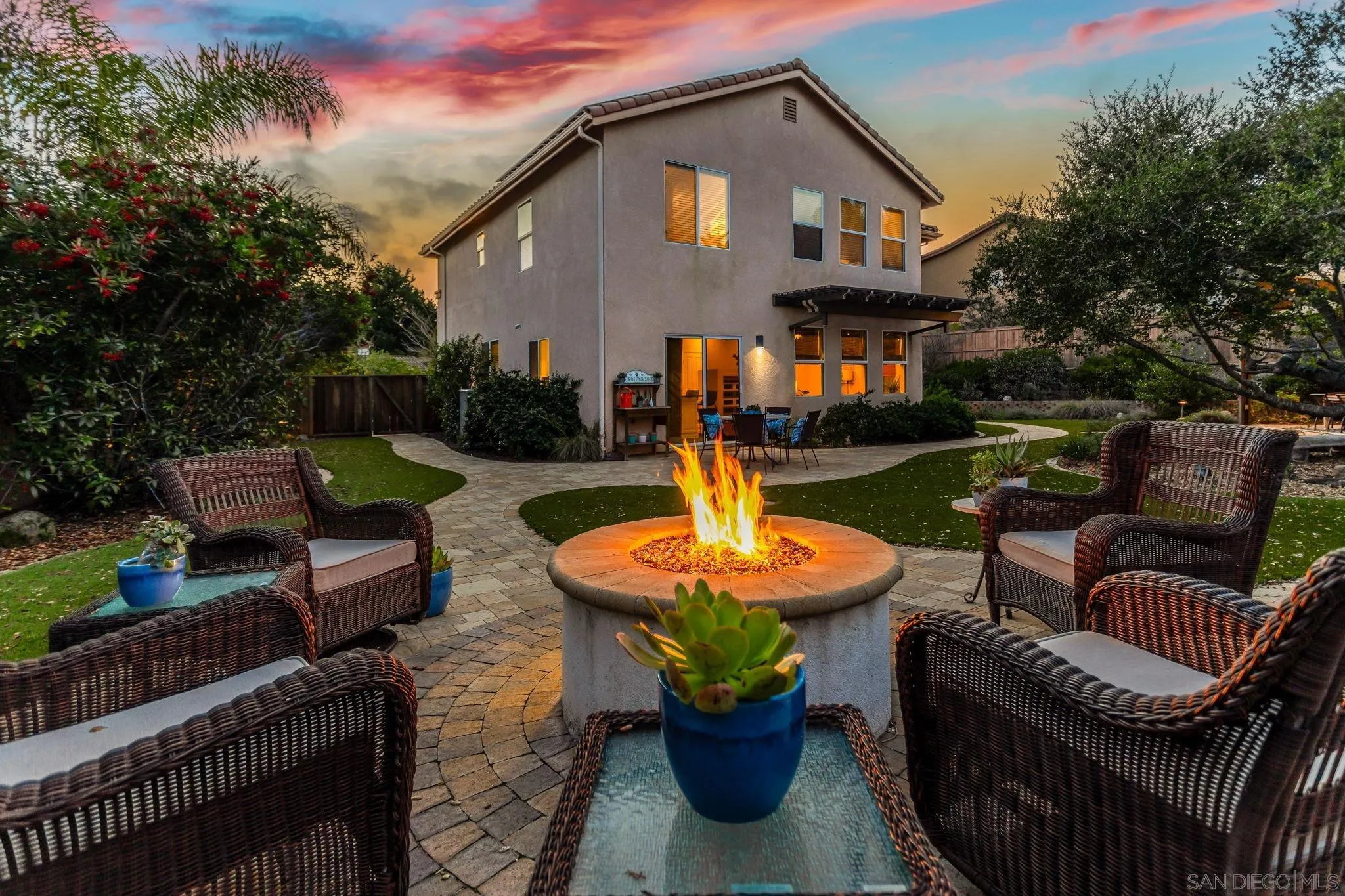 5462 Senegal Street Oceanside, CA 92057 - Photo 30 of 47 a front view of a house with garden and patio