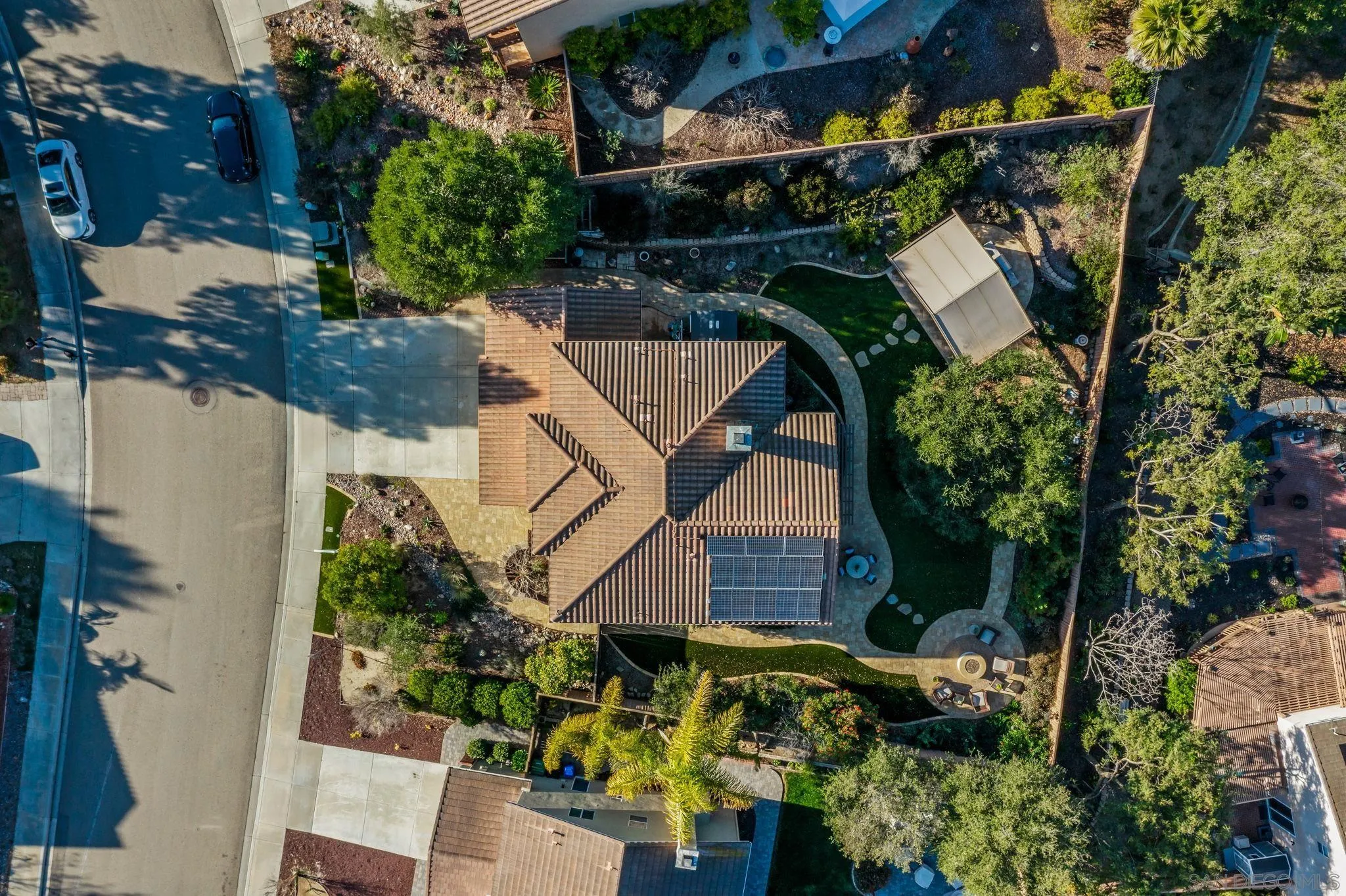 5462 Senegal Street Oceanside, CA 92057 - Photo 37 of 47 an aerial view of a house with a yard and potted plants
