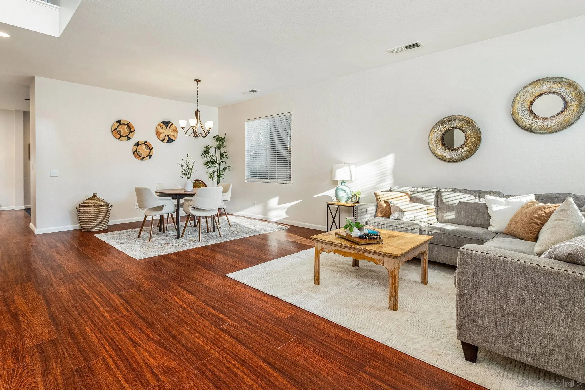 5462 Senegal Street Oceanside, CA 92057 - Photo 4 of 47 a living room with furniture and wooden floor