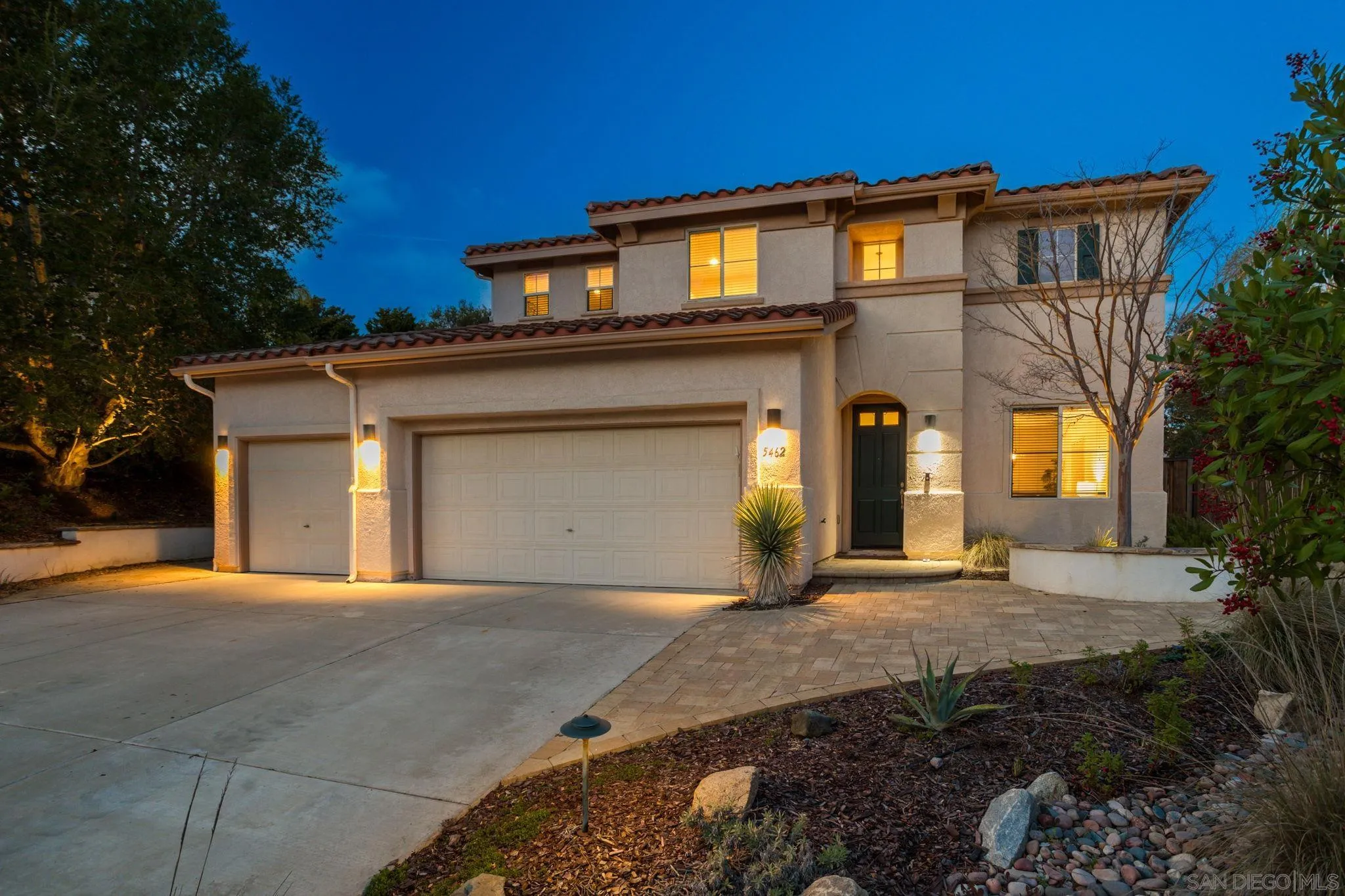 5462 Senegal Street Oceanside, CA 92057 - Photo 45 of 47 a front view of a house with a yard