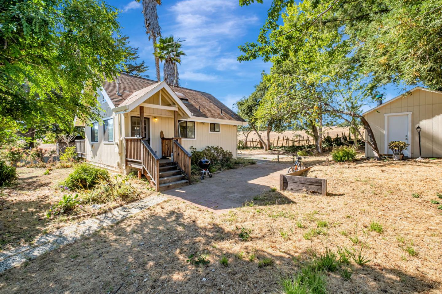 222 Highview Drive Santa Cruz, CA 95060 - Photo 21 of 29 a view of a yard with a house and a tree in the background