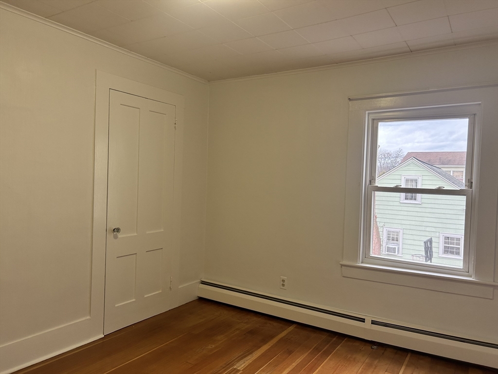 17 Lincoln Street, Unit 2 Greenfield, MA 01301 - Photo 21 of 26 an empty room with a window