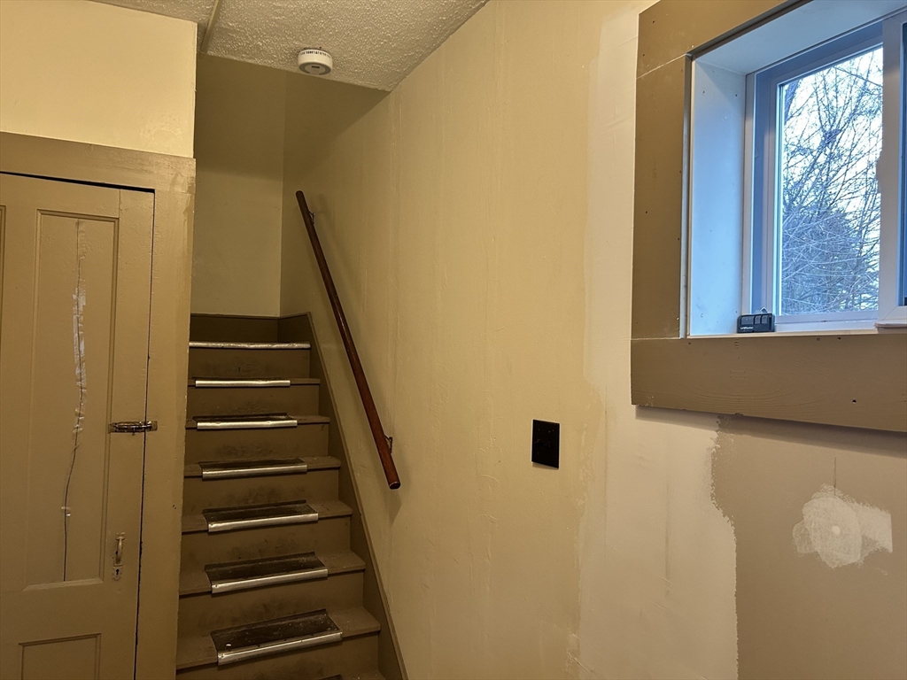 17 Lincoln Street, Unit 2 Greenfield, MA 01301 - Photo 25 of 26 a view of entryway with wooden floor and windows