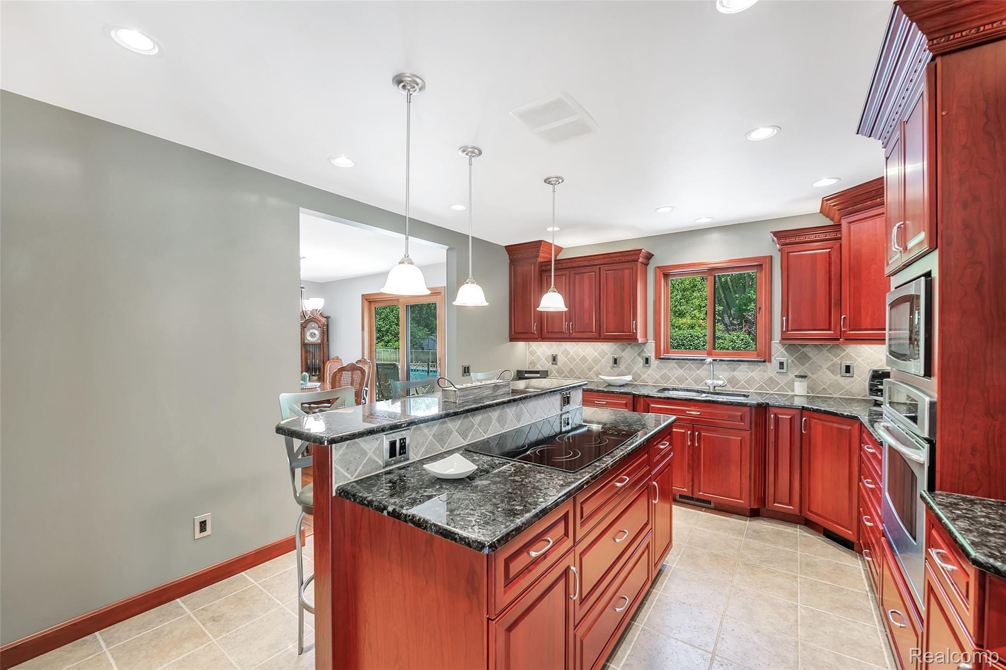 4054 Bennett Lake Road Fenton, MI 48430 - Photo 8 of 57 Custom Kitchen Remodeled in 2006 with Central Vac System & Porcelain Tile Flooring