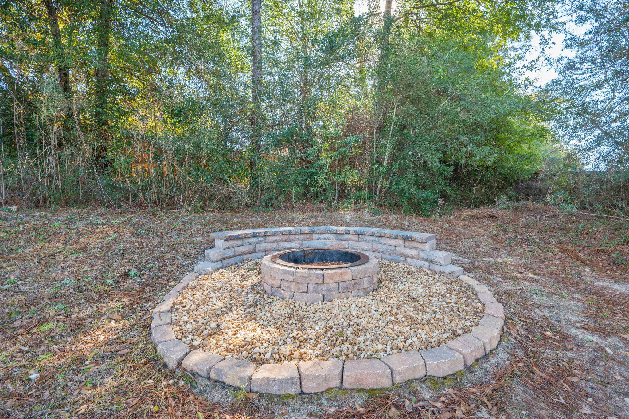 667 Red Fern Road Crestview, FL 32536 - Photo 36 of 42 a view of a backyard with fountain