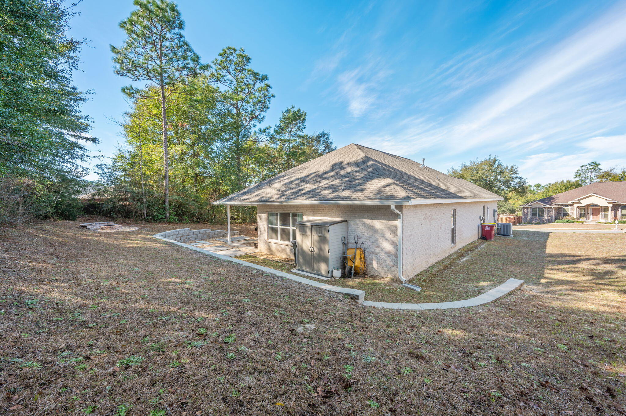 667 Red Fern Road Crestview, FL 32536 - Photo 38 of 42 a view of a house with a yard