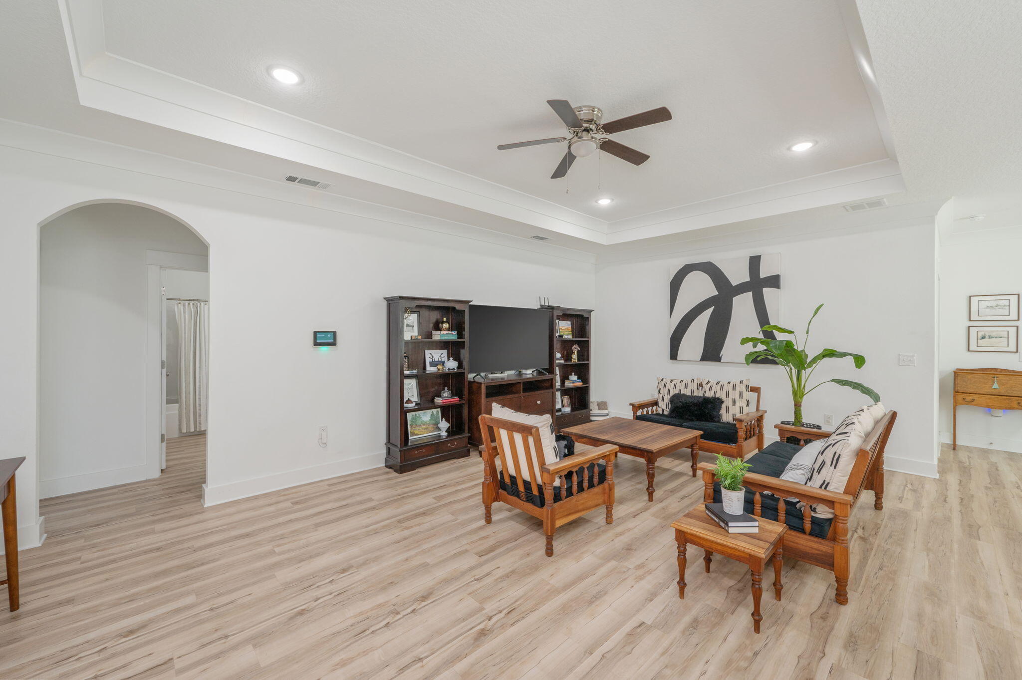 667 Red Fern Road Crestview, FL 32536 - Photo 6 of 42 a living room with furniture and a wooden floor