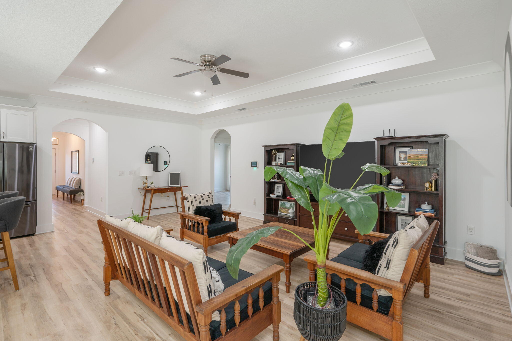 667 Red Fern Road Crestview, FL 32536 - Photo 7 of 42 a living room with furniture and a wooden floor